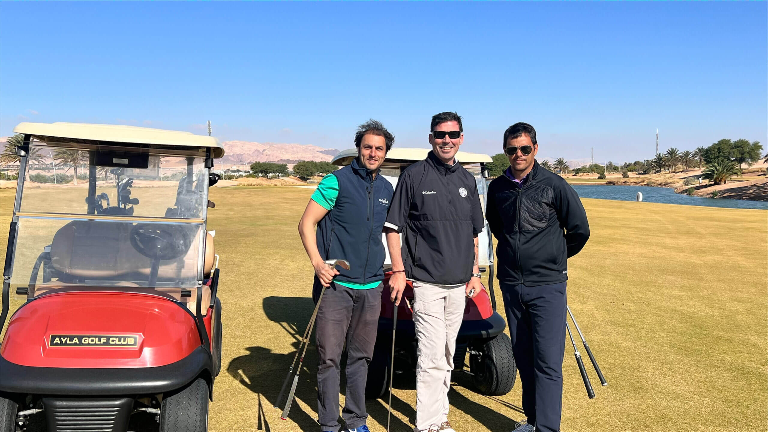 High-definition image of golfers at Ayla Golf Club.